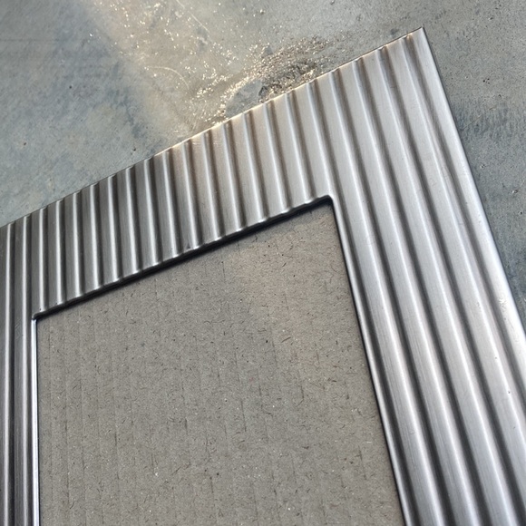 Steel ribbed modern frame. Holds 5x7 photo. No flaws. Back is black velvet - Picture 3 of 4